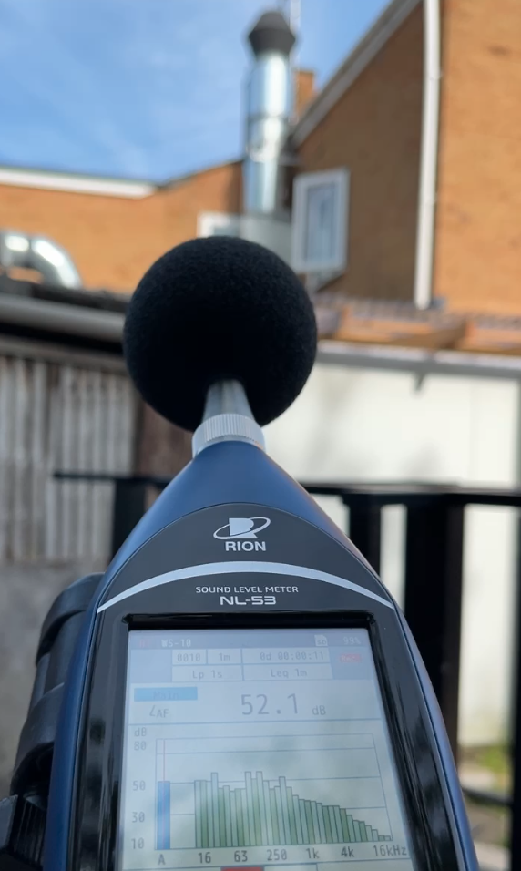 Rion NL-53 sound level meter showing the noise level of an extraction system in Haslingfield, Cambridgeshire
